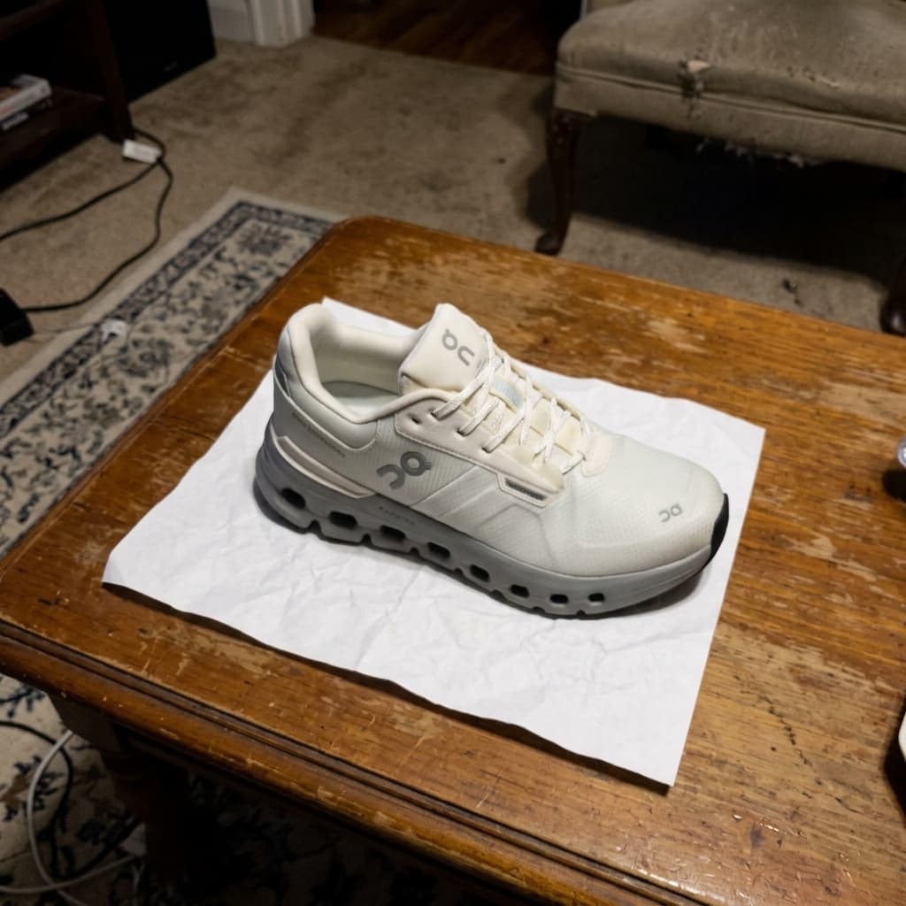 Running shoe on table — before AI generation